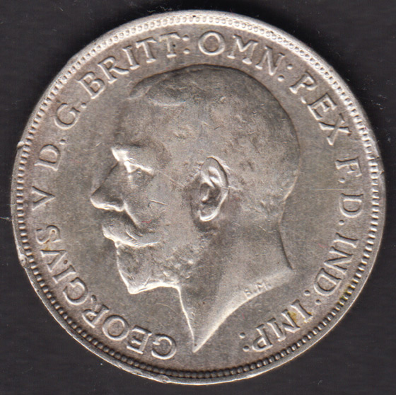 A close - up of a coin

Description automatically generated