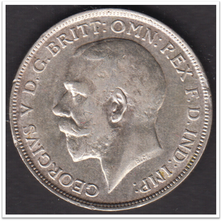 A close - up of a coin

Description automatically generated