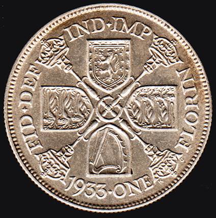 A close - up of a coin

Description automatically generated with medium confidence